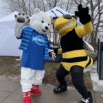 UWS Outdoor Recreation was onsite showcasing their program. They had a visit from Buzz!